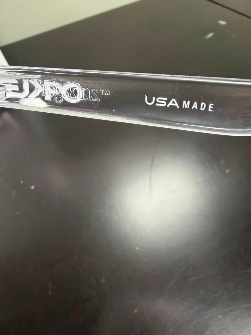 Oakley Kids Clear Frame Sunglasses with Purple Mirrored Lenses